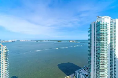 a view of the ocean from a tall building at City-View Retreat in Brickell 2BR and Free Parking in Miami