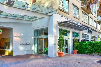 a store front of a building with windows at Stylish Midtown Miami Condo - Pool & Prime Location in Miami