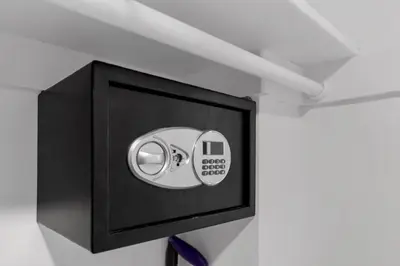 a safe with a button on a wall at Komffy Apartment with 2 King Beds OceanView at Tides in Hollywood