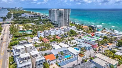 an aerial view of a city and the ocean at Beachside 1BR in Hollywood | Parking + WiFi in Dania Beach