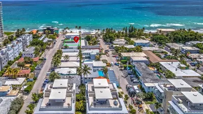 an aerial view of a street in front of the ocean at Beachside 1BR in Hollywood | Parking + WiFi in Dania Beach