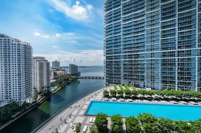 a view of a river between two tall buildings at Luxury Unit 1 Bed W Residences Brickell in Miami