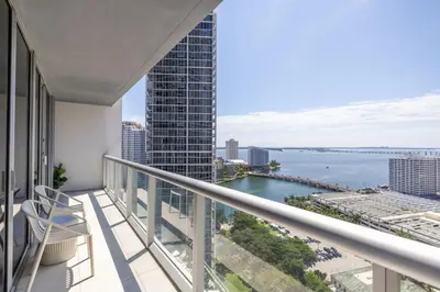a balcony with a view of the water at W Hotel 2BR Ocean View, Pool, Spa, Free Gym Classes in Miami
