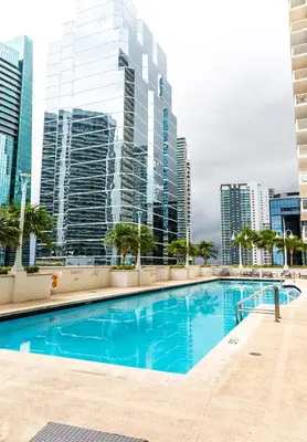 a swimming pool in a city with tall buildings at Top Stay Miami Gold Brickell in Miami
