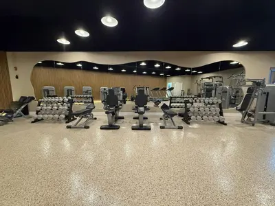 a gym with rows of chairs and tread machines at Shine Suites Balcony Duplex 11 in Miami Beach
