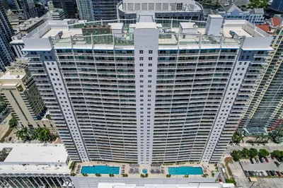 an aerial view of a large building in a city at Panoramic 2BR Bay-View in Brickell With Parking in Miami