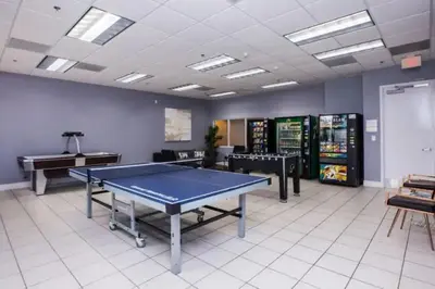 a room with a ping pong table in it at Cozy 2BR Apt at Brickell free parking in Miami