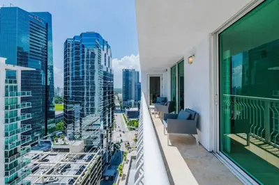 a balcony with a view of a city at Bright and Cozy 2 Bedroom in Miami