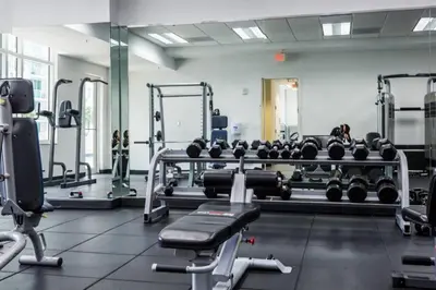 a gym with a lot of equipment in a room at SPECTACULAR apt Brickell Miami FREE PARKING in Miami