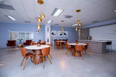 a large room with tables and chairs and a classroom at Exclusive 2BR APT Brickell Free Parking in Miami
