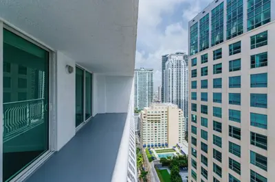 an apartment balcony with a view of a city at Lovely 2BR Rental in the Heart of Brickell in Miami