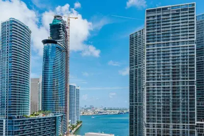 a view of two tall skyscrapers in a city at Exclusive, Amazing, Bright and Spacious at Brickell in Miami