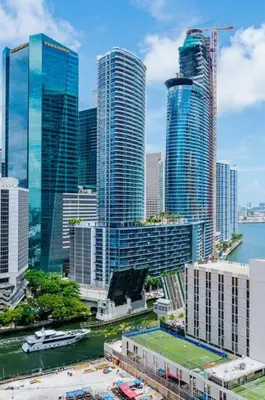 a city skyline with tall buildings and a tennis court at Exclusive, Amazing, Bright and Spacious at Brickell in Miami