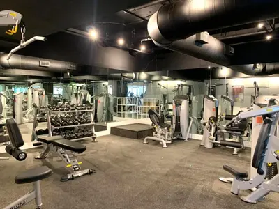 a gym with lots of exercise equipment in it at Alexander14192 in Miami Beach