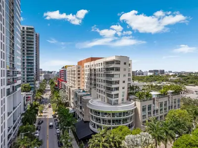 an aerial view of a city with tall buildings at Midtown Muse -Walkable Cozy amenity bldg w parking in Miami