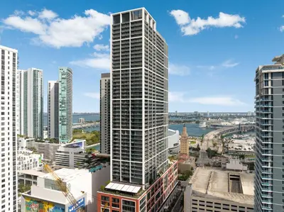 a view of a tall building in a city at Bellini Breeze - Cozy Central Miami Pool and Gym in Miami