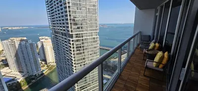 a balcony of a building with a view of the water at Miami brickell condo ocean view in Miami