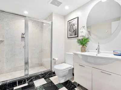 a bathroom with a shower and a toilet and a sink at MVR-Relax in Style Above Brickell in Miami