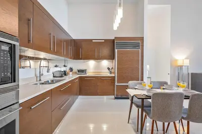 a kitchen with a table and chairs in it at MVR-Water Views & Modern Luxury in Miami