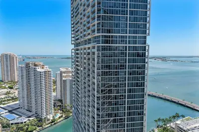 a tall building with a view of the ocean at MVR - Luxury Vibes Above the City in Miami