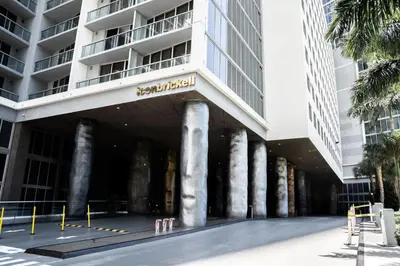 a building with columns in front of a building at MVR - Stylish Stay w Resort Access in Miami