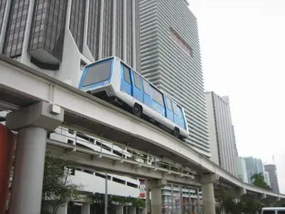 a bus on top of a bridge in a city at MVR - Magnificent Bay & River Views SPA Balcony in Miami