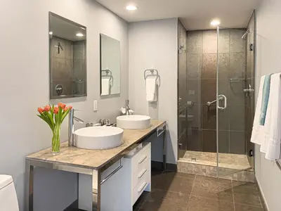 a bathroom with two sinks and a shower at MVR - Magnificent Bay & River Views SPA Balcony in Miami