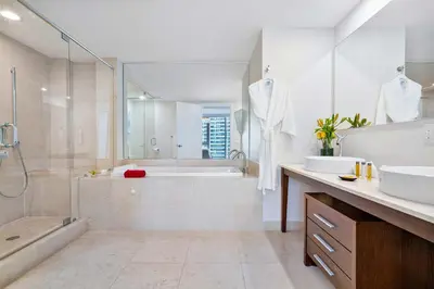 a bathroom with a tub and a shower and a sink at MVR - Icon Brickell Beauty with Views in Miami