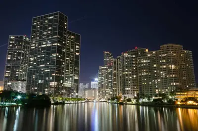 a city skyline with tall buildings at night at MVR - Live the Icon Brickell Dream in Miami