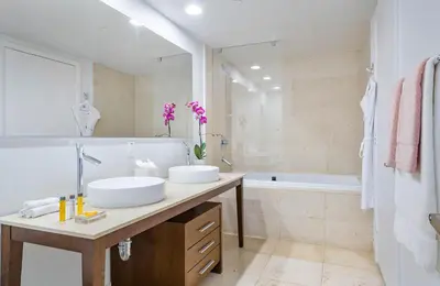a bathroom with two sinks and a tub at MVR - High-End Condo with Miami Views in Miami