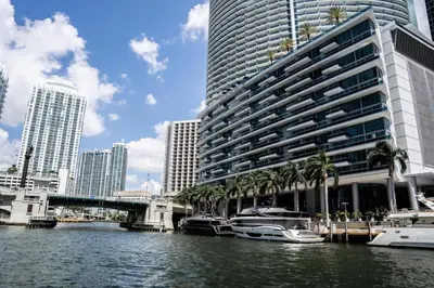 a large building with boats in the water in a city at MVR - Luxury & Location at Icon Brickell in Miami