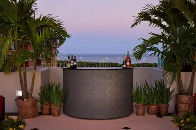 a bar with bottles of wine on top of a building at MVR - Steps from Miami-s Top Attractions in Miami
