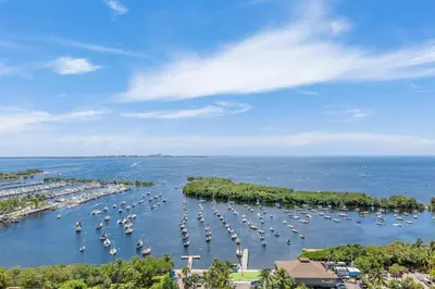 an aerial view of a harbor with boats in the water at MVR-Tired of Hotels This Stay Breaks the Mold in Miami