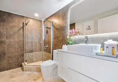 a bathroom with a shower and a toilet and a sink at MVR - Where Families and Professionals Align in Miami