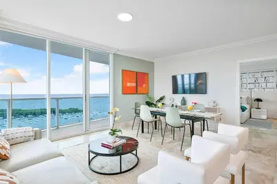 a living room with a table and a dining room at MVR-Coconut Grove-s Best Kept Secret-Revealed in Miami