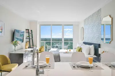 a living room with a kitchen and a living room at MVR-Your Gateway to Miami-s Culture & Calm in Miami