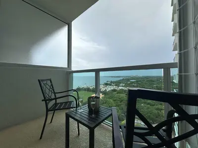 a room with a table and two chairs and a window at MVR - Gorgeous Views and Refined Living Spaces in Miami