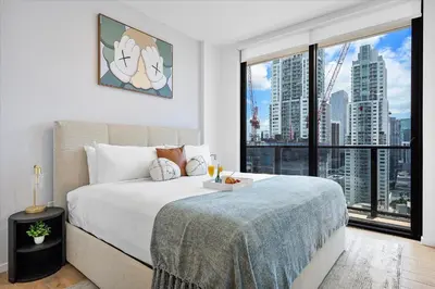 a bedroom with a large bed and a large window at MVR - If You Want the Best Views Stay Here in Miami
