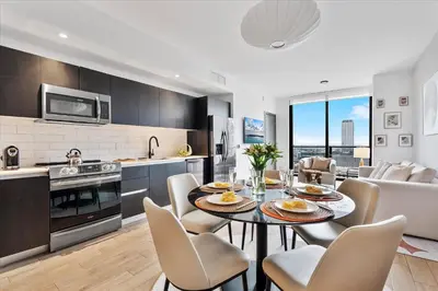 a kitchen and dining room with a table and chairs at MVR - If You Want the Best Views Stay Here in Miami