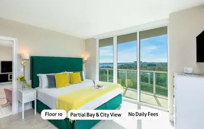 a bedroom with a bed and a large window at MVR - Miami's Most Exclusive Stay-Revealed in Miami
