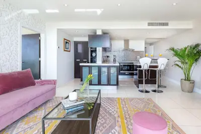 a living room with a couch and a table at MVR - Miami's Most Exclusive Stay-Revealed in Miami