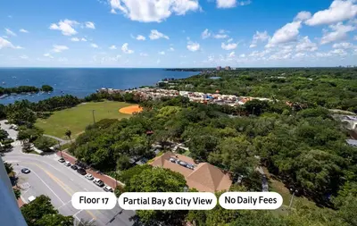 an aerial view of a city and the ocean at MVR - Stay Near Brickell Without the Hassle in Miami