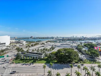 an aerial view of a city with palm trees and a harbor at MVR - Only for VIP Travelers - Luxe Stay in Downtown in Miami