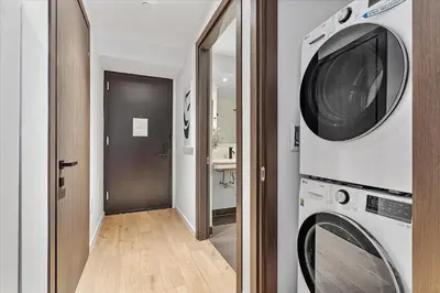 a laundry room with a washer and a dryer at MVR - 5-Star Downtown Stay Near Miami-s Hotspots in Miami