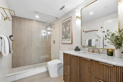 a bathroom with a shower and a toilet and a sink at MVR - A Suite That-s Actually as Good as It Looks in Miami
