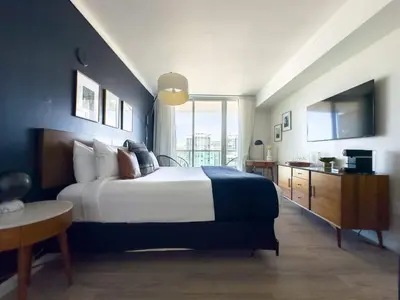 a bedroom with a large bed and a large window at MVR - Limited Bay View Suites-Book Fast in Miami