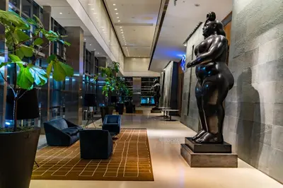 a statue in the lobby of a building at Four Seasons Miami Two Bedroom - 2Bath Ocean view Suite - Amazing views in Miami