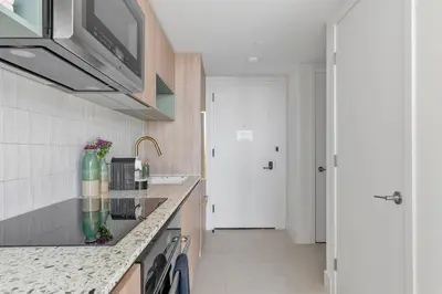 a kitchen with a sink and a counter top at MVR Skyline Luxury in Downtown Miami in Miami