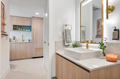 a bathroom with a sink and a mirror at MVR Skyline Luxury in Downtown Miami in Miami