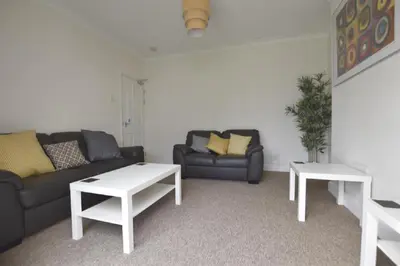 a living room with a couch and two tables at Gorgeous apartment near South Beach in Miami Beach